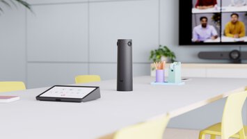 Video conference table with the Logitech Sight in focus.